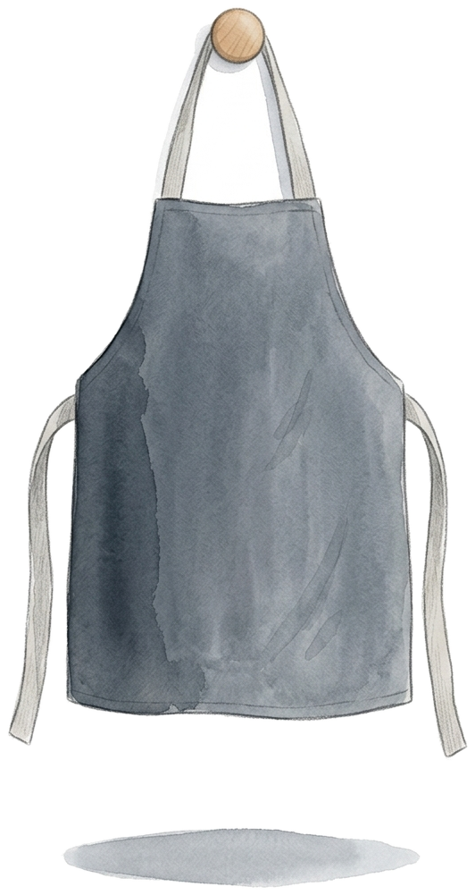 a slate apron hanging from a wooden peg